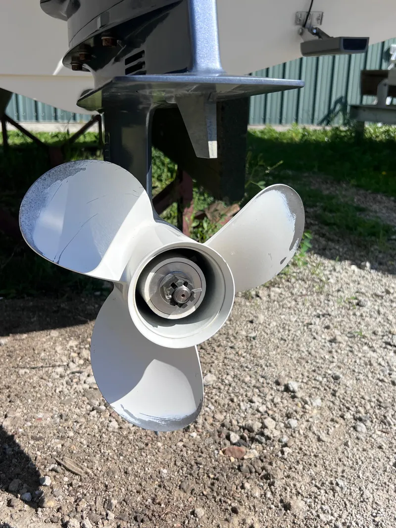 Slide: The Image of 2017 Stingray 182 SC boat propeller on gravel surface. - 15