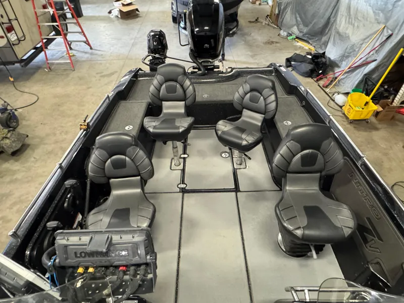 Slide: The Image of Lowrance HDS display on 2022 Nitro ZV21 boat dashboard in a garage setting. - 12