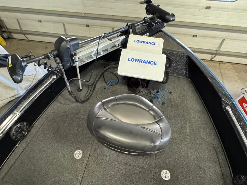 Slide: The Image of 2022 Nitro ZV21 boat seat with sleek black and gray design. - 13