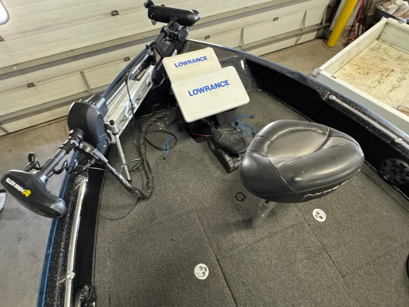 Slide: The Image of 2022 Nitro ZV21 boat compartment with blue interior and black trim. - 16