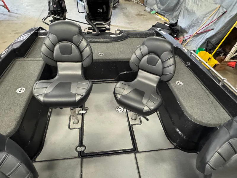 Slide: The Image of 2022 Nitro ZV21 boat dashboard with dual Lowrance displays and steering wheel. - 8