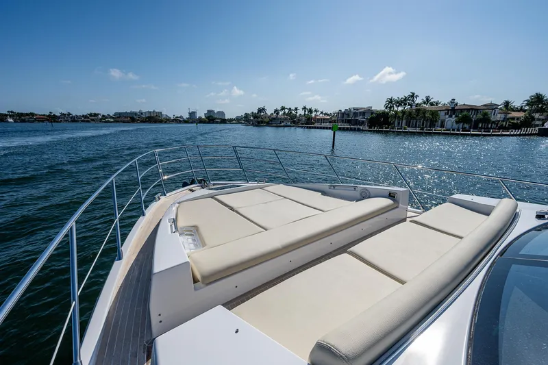 Slide: The Image of Azimut 55S 2014 yacht with sun loungers on deck, cruising in sunny waters. - 13