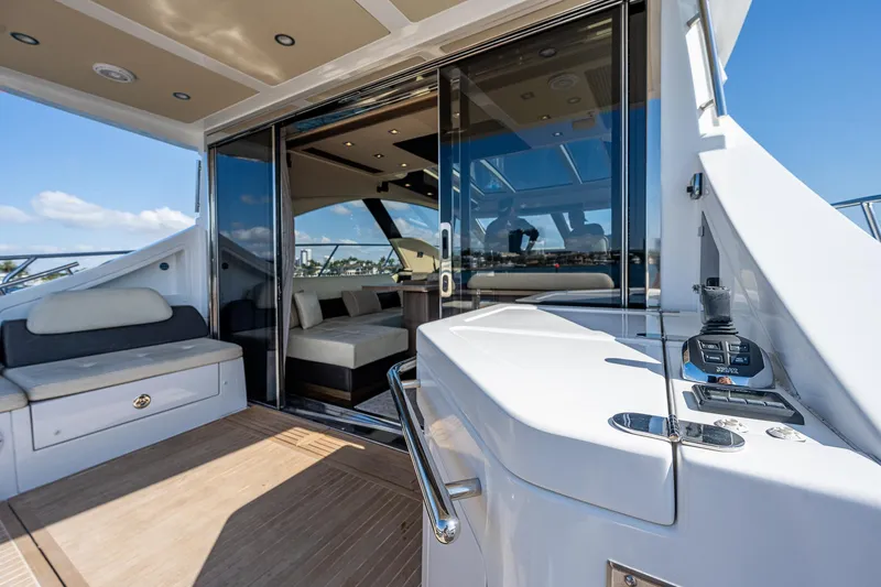 Slide: The Image of Luxurious 2014 Azimut 55S yacht interior with spacious seating and modern design. - 26