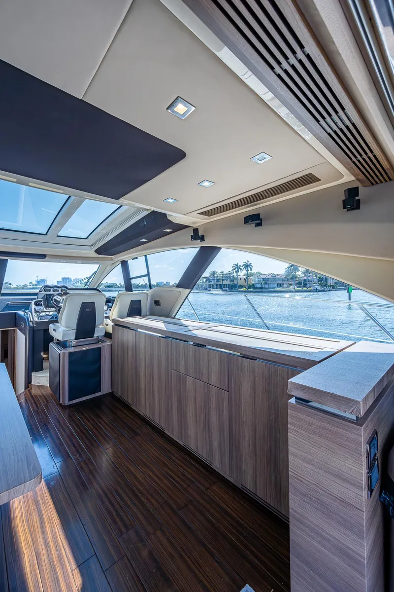 Slide: The Image of Interior of 2014 Azimut 55S yacht with modern design and panoramic windows. - 28