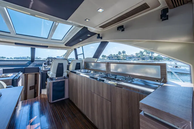 Slide: The Image of Luxurious interior of a 2014 Azimut 55S yacht with modern design and panoramic windows. - 29