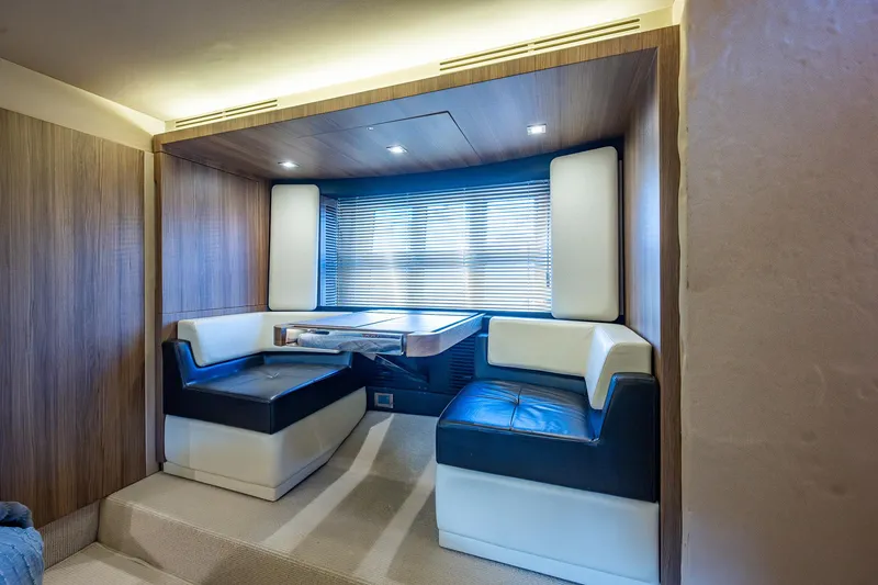 Slide: The Image of Luxurious interior of 2014 Azimut 55S yacht with modern seating and ambient lighting. - 41