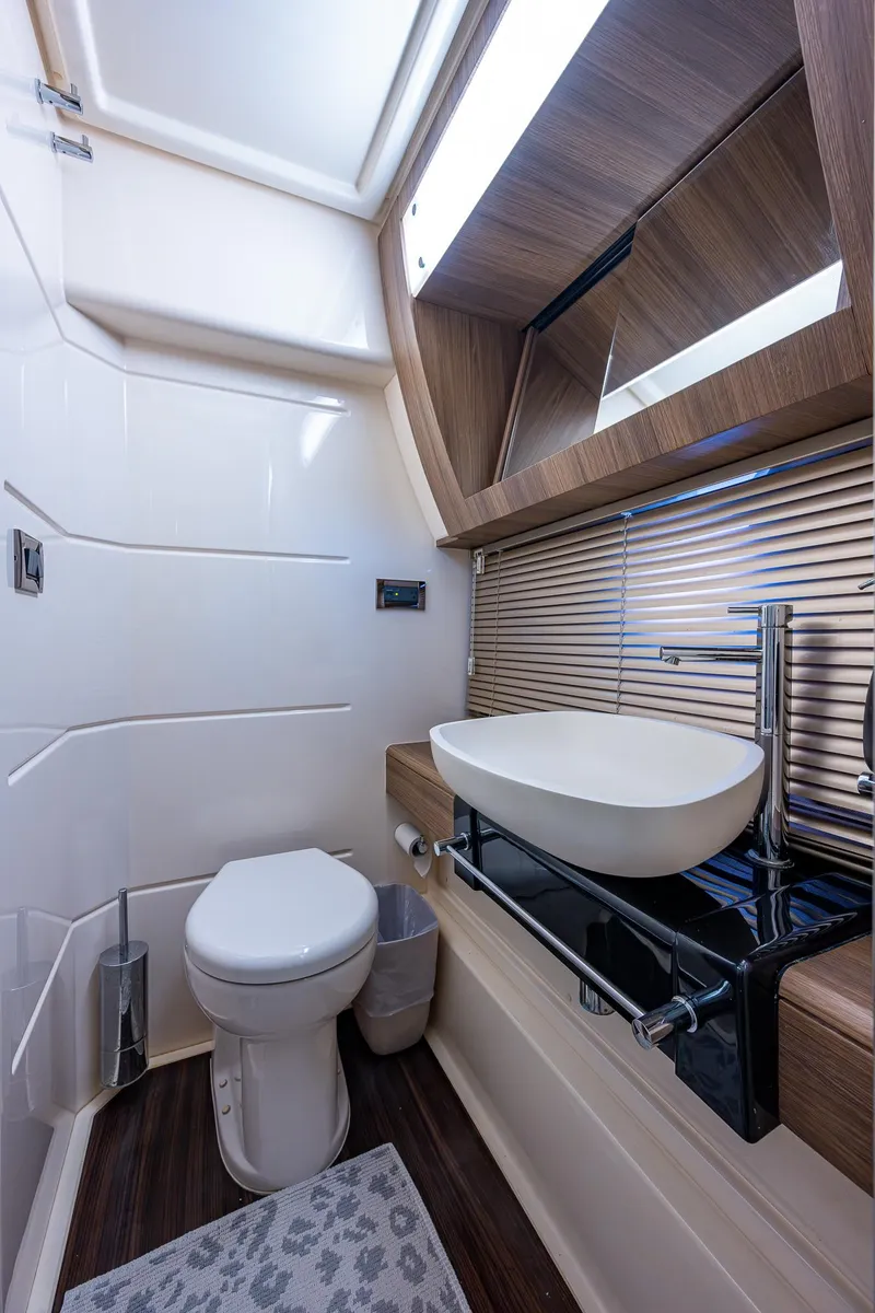 Slide: The Image of Luxurious bathroom in 2014 Azimut 55S yacht with modern fixtures and elegant design. - 46