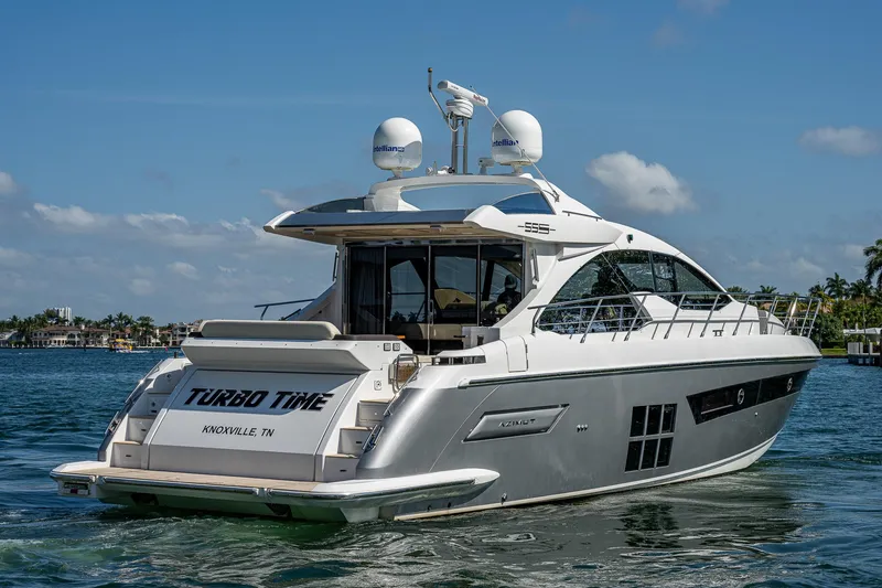 Slide: The Image of 2014 Azimut 55S yacht on water, rear view, clear sky background. - 6