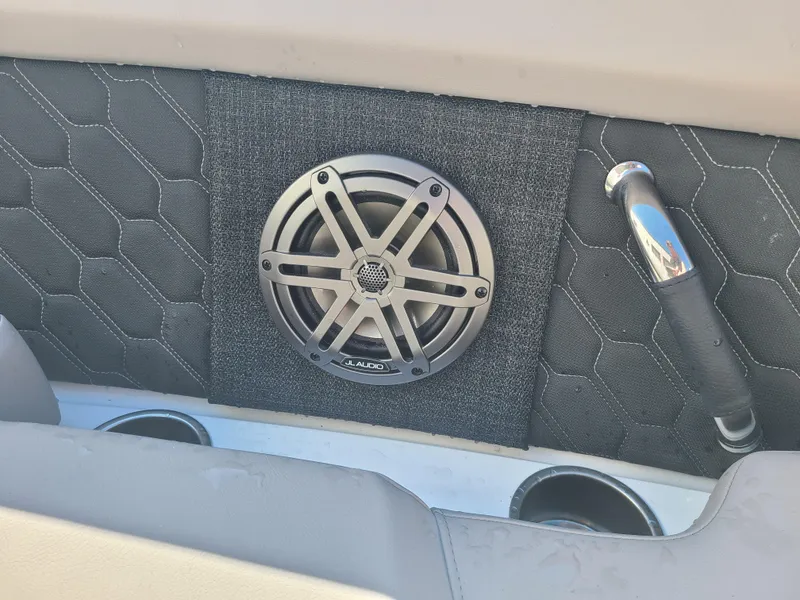 Slide: The Image of Speaker and handle on 2023 Four Winns H2 boat interior panel. - 8