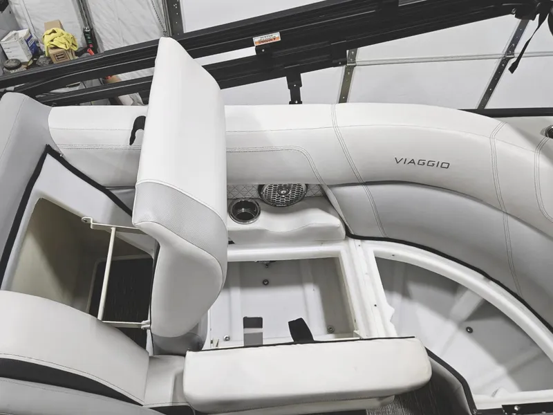 Slide: The Image of 2023 Viaggio Diamante U boat interior with white seating and storage compartment. - 13
