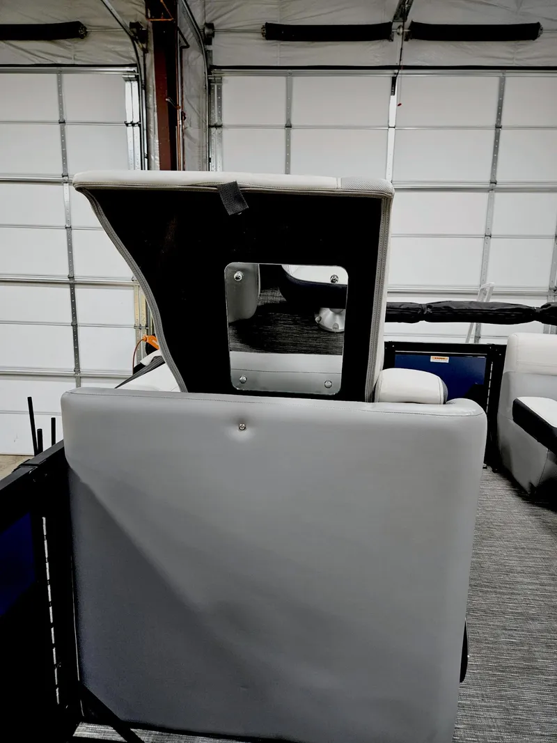 Slide: The Image of 2023 Viaggio Diamante U boat seat with storage compartment in a garage setting. - 15