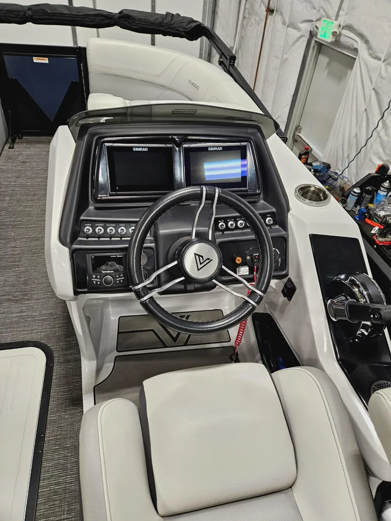 Slide: The Image of 2023 Viaggio Diamante U boat dashboard with dual screens and modern steering wheel. - 5