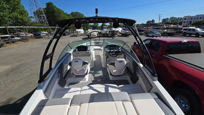 Slide: The Image of 2019 Chaparral 21 H2O Sport boat with sleek interior and modern design. - 20