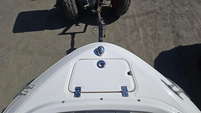 Slide: The Image of 2019 Chaparral 21 H2O Sport boat bow on trailer, top view. - 21