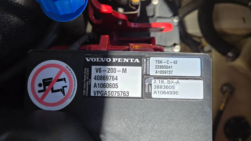 Slide: The Image of Volvo Penta engine label on 2019 Chaparral 21 H2O Sport boat, showing model and serial numbers. - 44