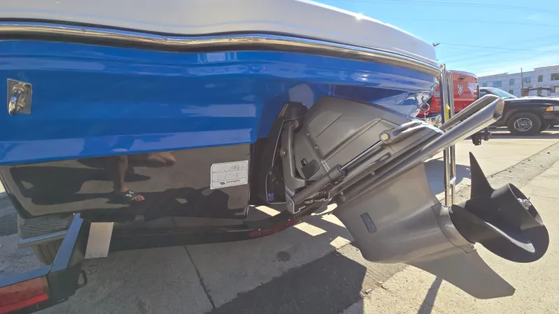 Slide: The Image of 2019 Chaparral 21 H2O Sport boat stern and outdrive in sunlight. - 6