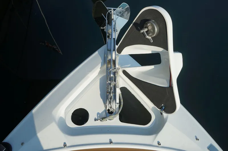 Slide: The Image of 2023 Four Winns H2 Surf boat bow with anchor and sleek design. - 14