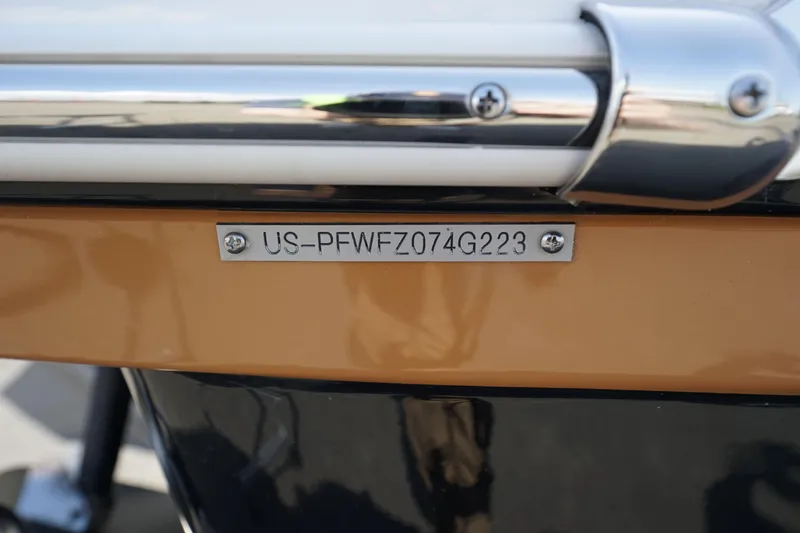 Slide: The Image of 2023 Four Winns H2 Surf boat identification plate with serial number. - 23