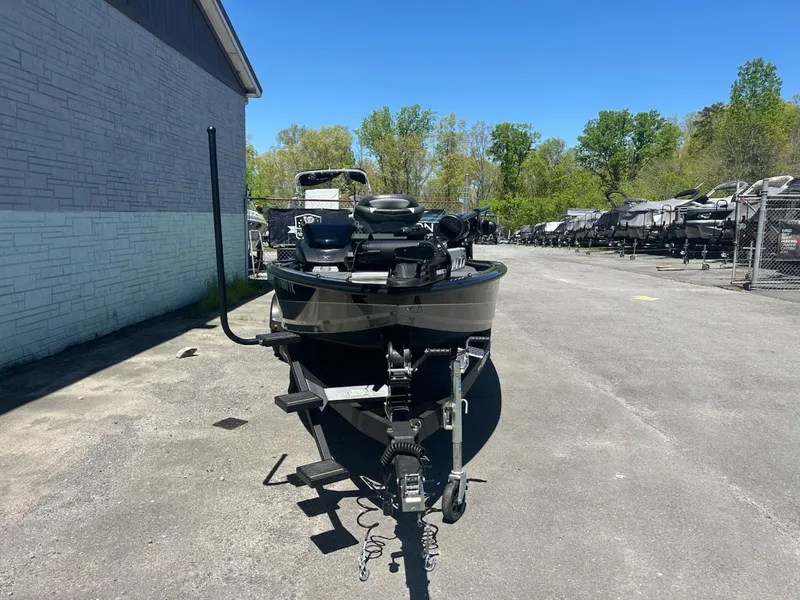 Slide: The Image of 2022 Vexus AVX1880 boat parked outdoors on a sunny day. - 3