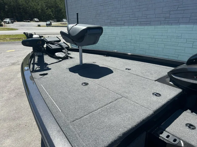 Slide: The Image of 2022 Vexus AVX1880 boat deck with seating and equipment, parked outdoors. - 8