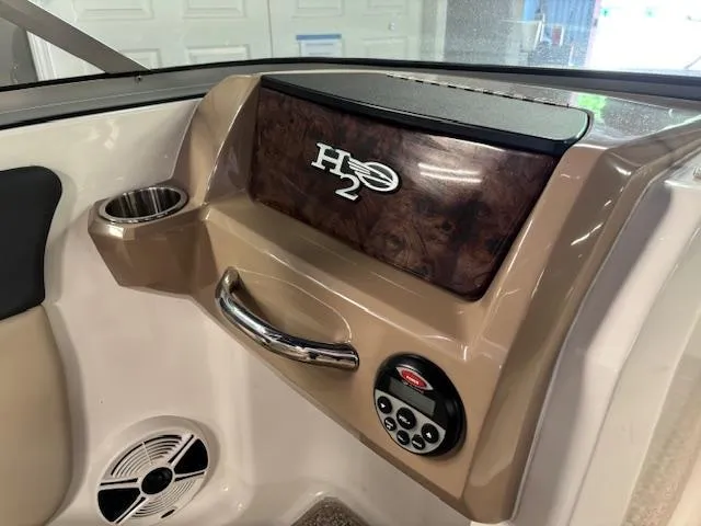 Slide: The Image of Interior of 2013 Chaparral 19 H2O Ski & Fish boat dashboard with controls. - 9