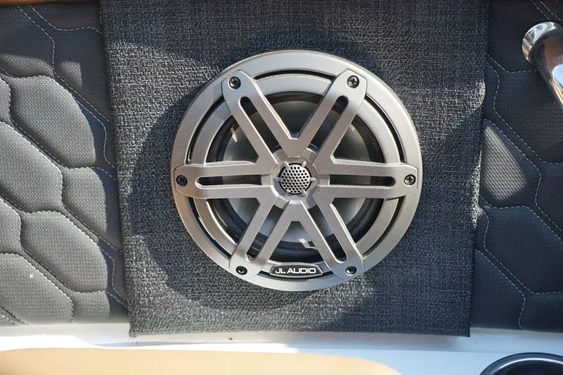 Slide: The Image of 2023 Four Winns H2 Surf boat speaker with stylish grille design. - 13