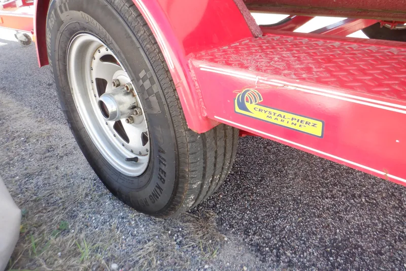 Slide: The Image of Red trailer for 2003 Glastron SX 195 boat, featuring Crystal-Pierz Marine logo. - 10