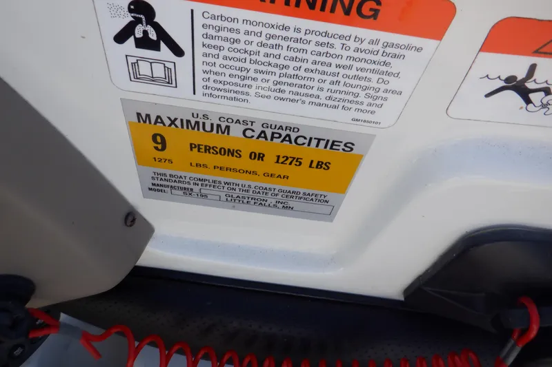 Slide: The Image of 2003 Glastron SX 195 capacity label: 9 persons or 1275 lbs maximum. - 29