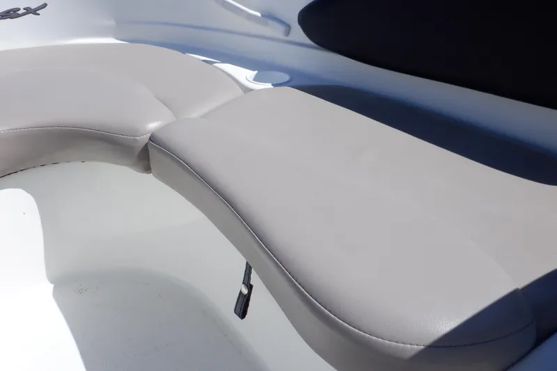 Slide: The Image of 2003 Glastron SX 195 boat interior with beige seating. - 32