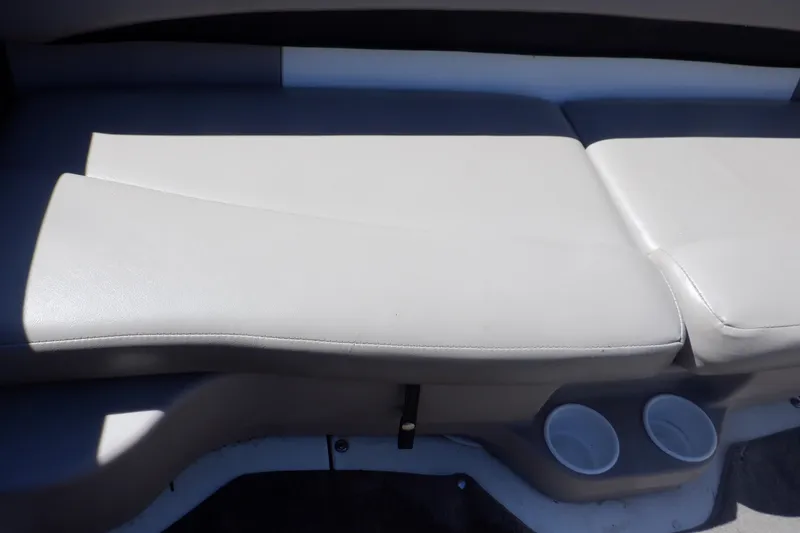 Slide: The Image of 2003 Glastron SX 195 boat interior seating with cup holders. - 39