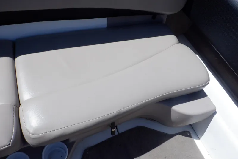 Slide: The Image of 2003 Glastron SX 195 boat seat, beige upholstery, close-up view. - 40