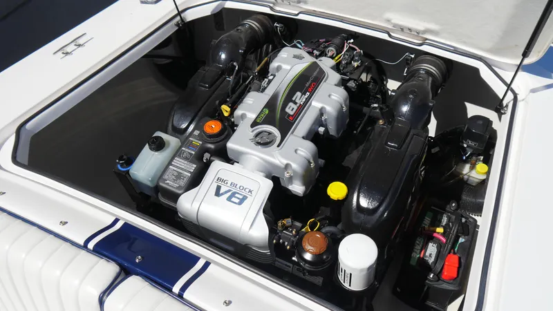Slide: The Image of 2022 Donzi 22 Classic engine compartment featuring a powerful V8 engine. - 18