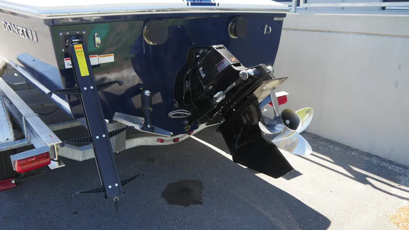 Slide: The Image of 2022 Donzi 22 Classic boat stern with outboard motor on trailer. - 5