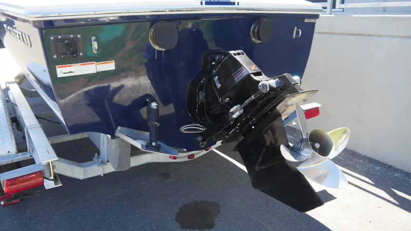 Slide: The Image of 2022 Donzi 22 Classic boat stern with propeller and trailer. - 6