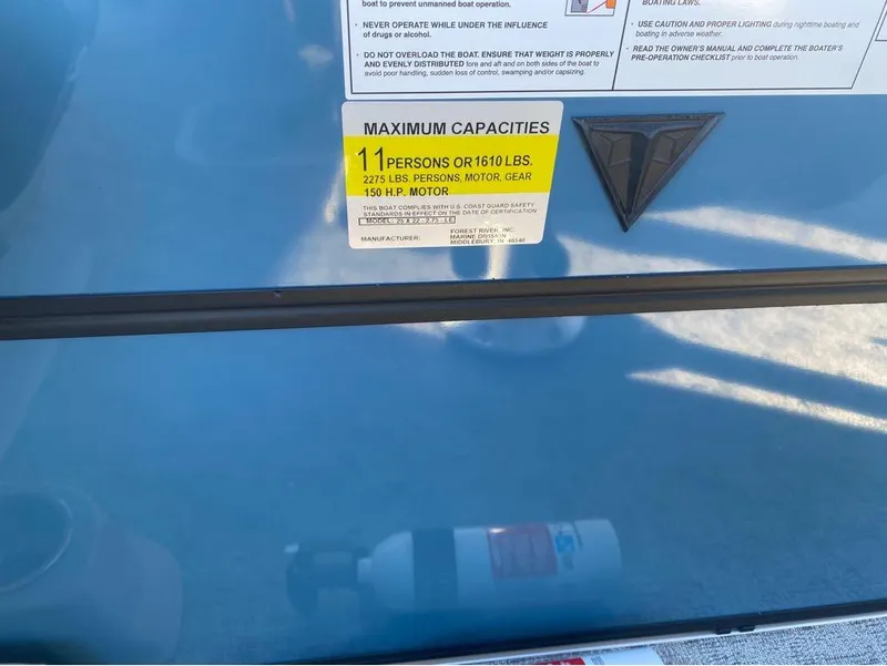 Slide: The Image of 2025 Trifecta LE Series 22RF LE boat capacity label, maximum 11 persons or 1610 lbs. - 4