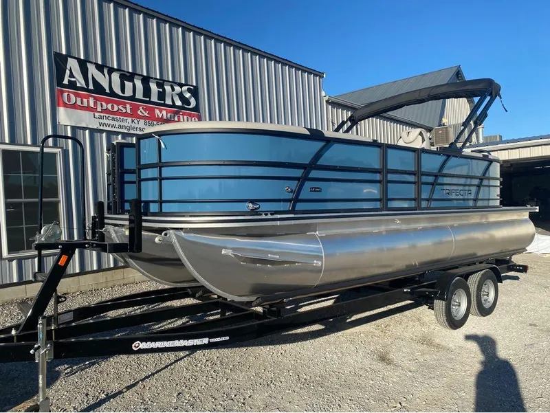 Slide: The Image of 2025 Trifecta LE Series 22RF pontoon boat on trailer at Anglers Outpost & Marine. - 5