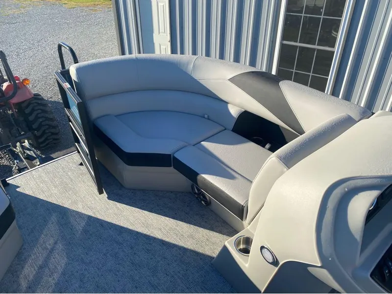Slide: The Image of 2025 Trifecta LE Series 22RF LE pontoon boat interior with plush seating. - 6