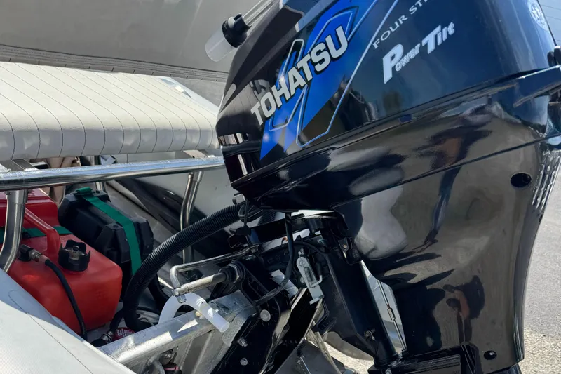 Slide: The Image of 2011 AB Inflatables Alumina 10 ALX with Tohatsu outboard motor, featuring power tilt. - 4