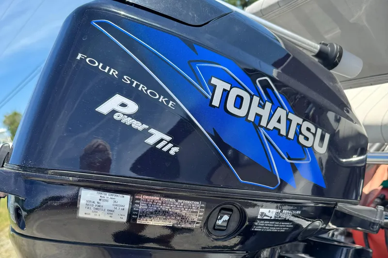 Slide: The Image of Tohatsu four-stroke outboard motor with power tilt on AB Inflatables Alumina 10 ALX, 2011 model. - 7