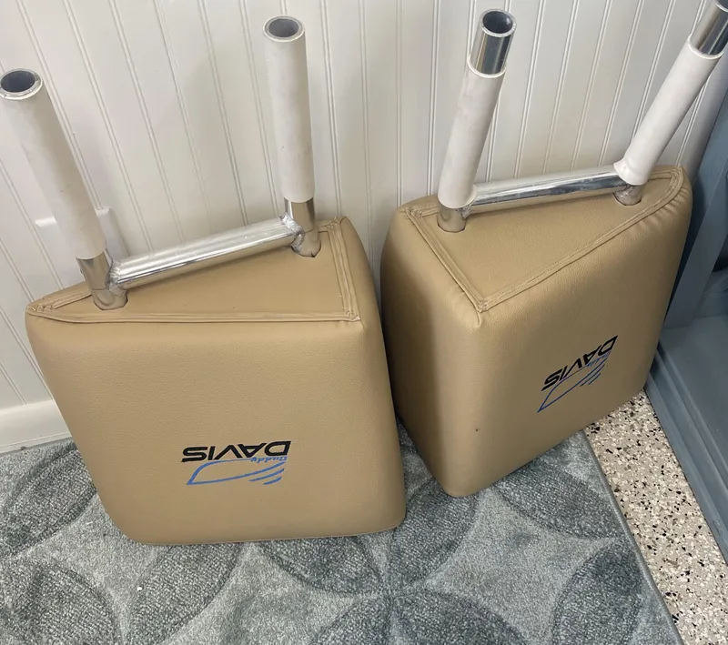 Slide: The Image of Cushioned boat seats from a 2018 Buddy Davis 28 Center Console, leaning against a wall. - 11