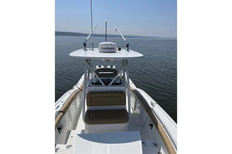 Slide: The Image of 2018 Buddy Davis 28 Center Console boat on calm water, featuring Garmin equipment. - 5