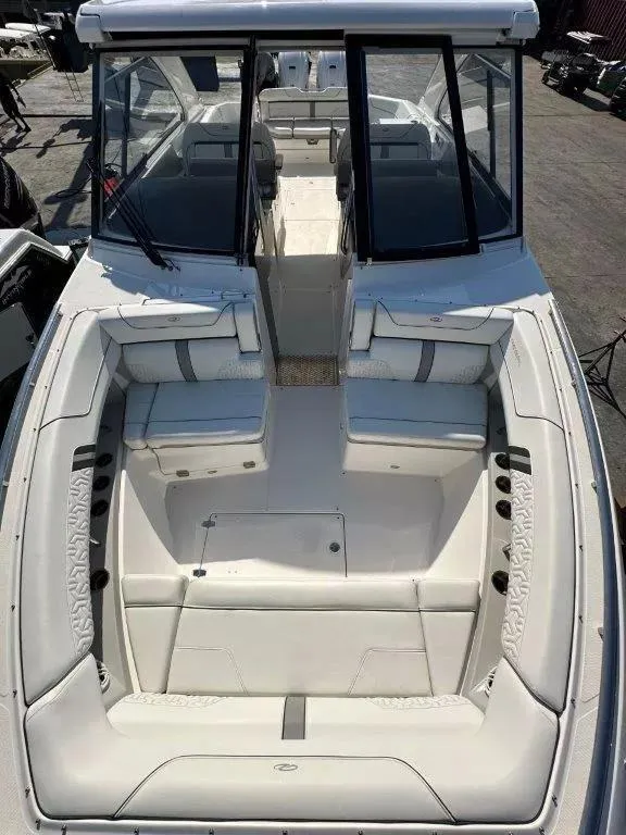 Slide: The Image of 2023 Regal LX36 boat interior with spacious seating and modern design. - 9