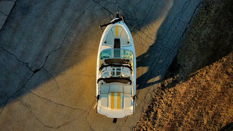 Slide: The Image of Overhead view of 2012 Chaparral 19 Ski & Fish H2O boat on pavement. - 3