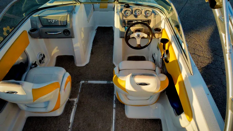 Slide: The Image of Interior of 2012 Chaparral 19 Ski & Fish H2O boat with yellow and white seating. - 6