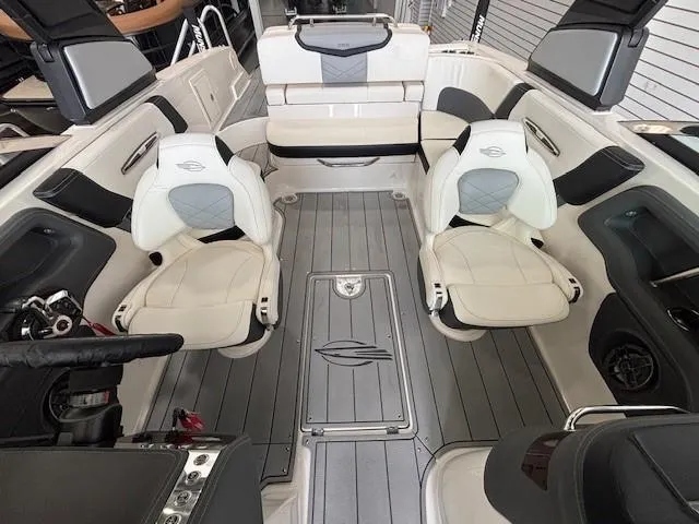 Slide: The Image of 2023 Chaparral 267 SSX boat interior with luxurious seating and modern design. - 10