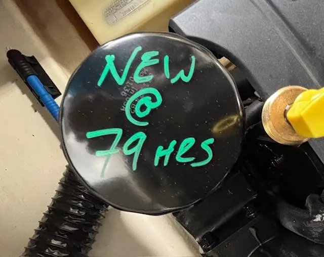 Slide: The Image of Engine component labeled 'New @ 79 Hrs' in 2023 Chaparral 267 SSX boat. - 25