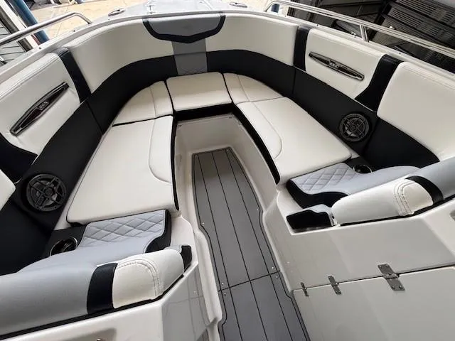 Slide: The Image of 2023 Chaparral 267 SSX boat interior with luxurious seating and modern design. - 3