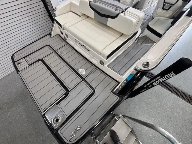Slide: The Image of 2023 Chaparral 267 SSX boat interior with sleek seating and modern design. - 5