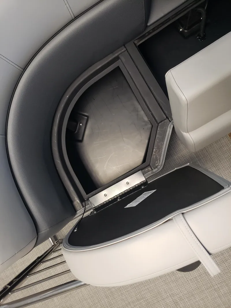 Slide: The Image of 2025 Bentley Pontoons Elite Admiral interior storage compartment with sleek, modern design. - 10