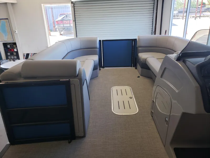 Slide: The Image of 2025 Bentley Pontoons Elite Admiral interior with spacious seating and modern design. - 12